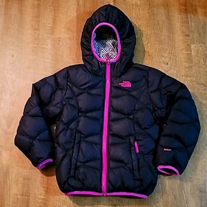 Reversible downfield jacket by The North Face black and pink reverse to zebra